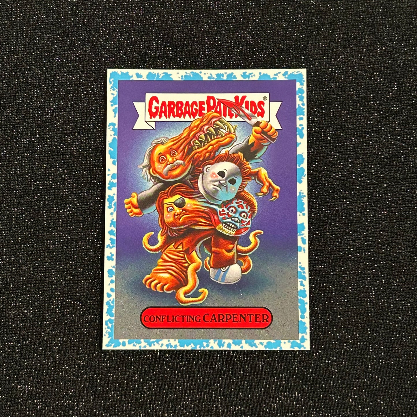 2019 GARBAGE PAIL KIDS REVENGE OF OH THE HORROR-IBLE: CONFLICTING CARPENTER 2b SPIT BLUE 29/99 - NM