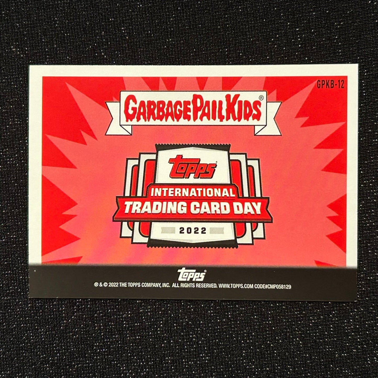 2022 TOPPS INTERNATIONAL TRADING CARD DAY GARBAGE PAIL KIDS: CHESHIRE PAT GPKB-12 - NM
