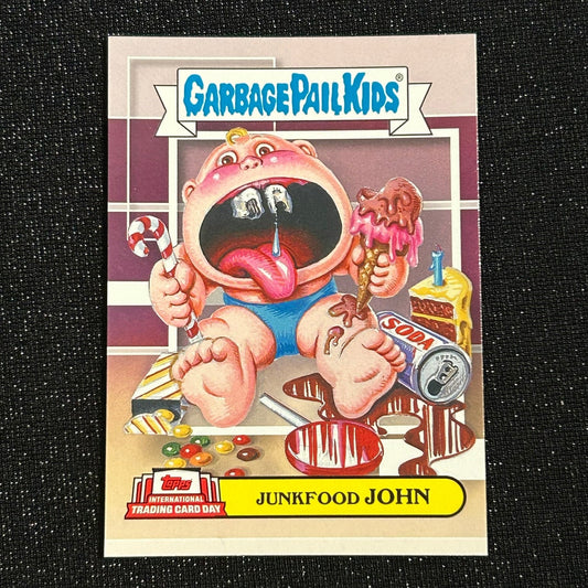2022 TOPPS INTERNATIONAL TRADING CARD DAY GARBAGE PAIL KIDS: JUNKFOOD JOHN GPK0S1-2 -NM